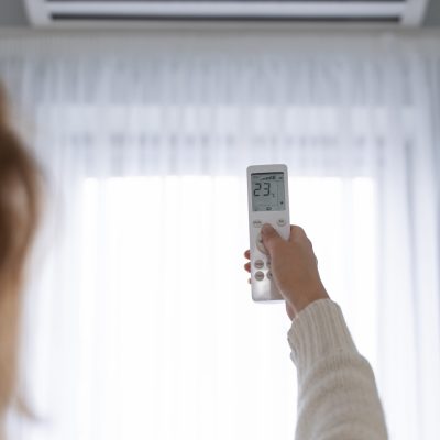 woman-holding-remote-start-heater